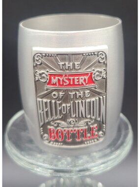 VTG 2002 Jack Daniel's Mystery of the Belle of Lincoln Bottle Metal Shot Glass